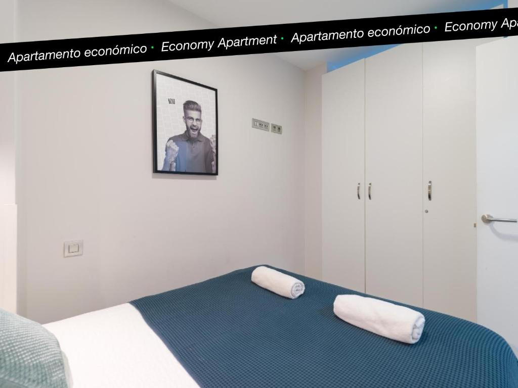 A bed or beds in a room at Tusity Yeah Apartments