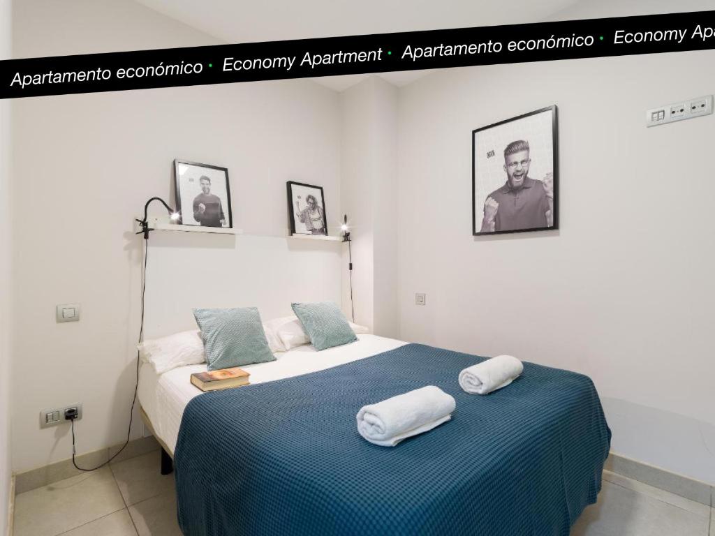 A bed or beds in a room at Tusity Yeah Apartments