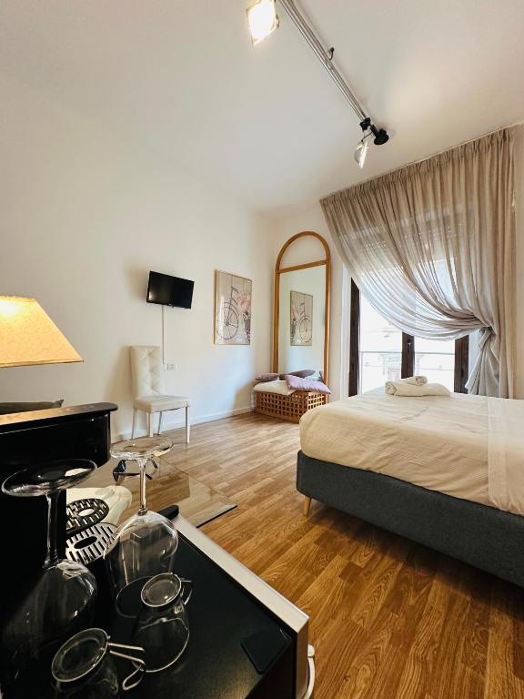 Postel nebo postele na pokoji v ubytování B&B Degli Artisti Suite