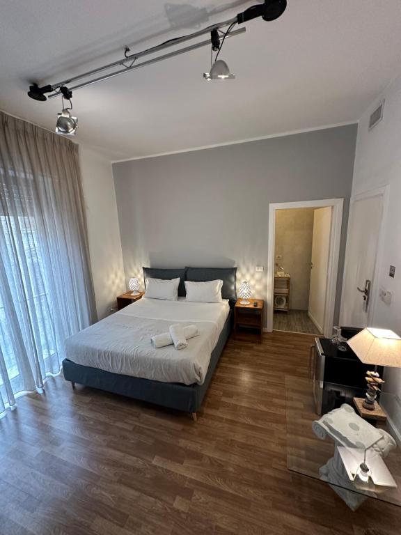 Postel nebo postele na pokoji v ubytování B&B Degli Artisti Suite