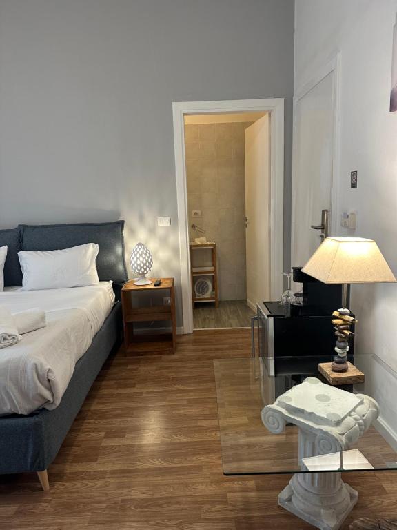 Postel nebo postele na pokoji v ubytování B&B Degli Artisti Suite