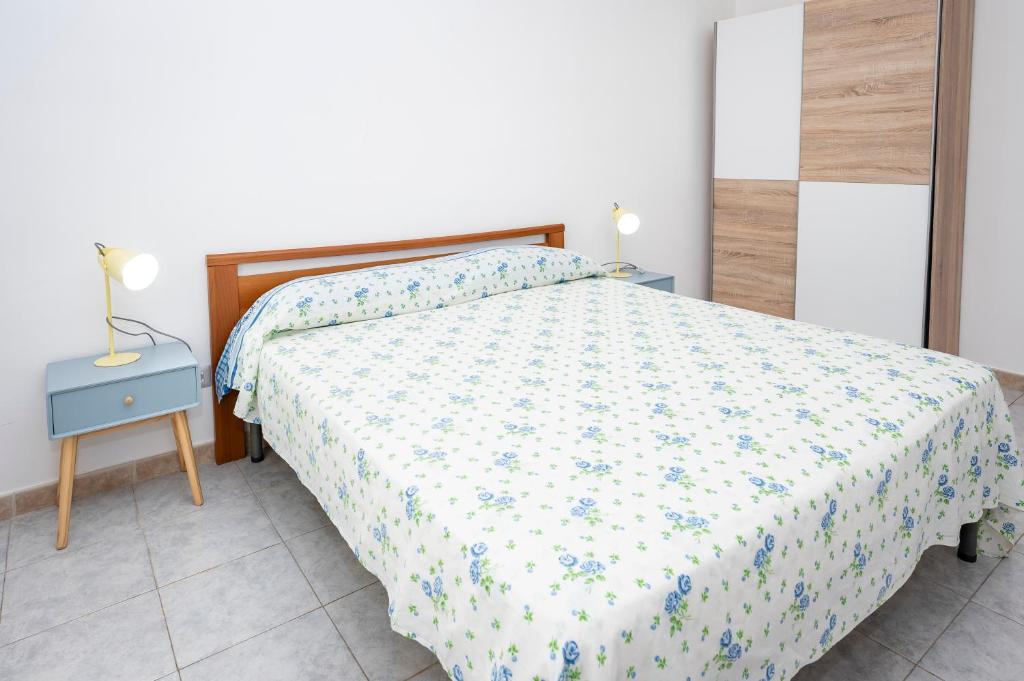 A bed or beds in a room at Casa Vacanze D'Urso
