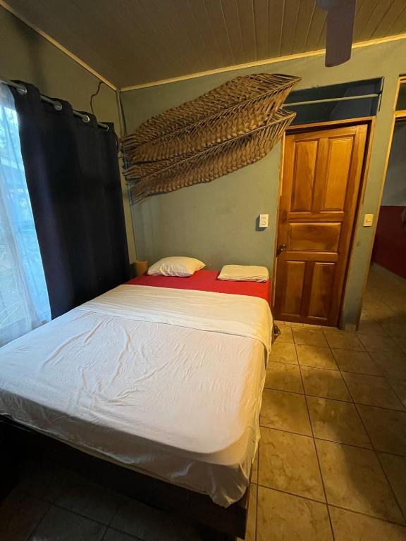 Postel nebo postele na pokoji v ubytování Surf House