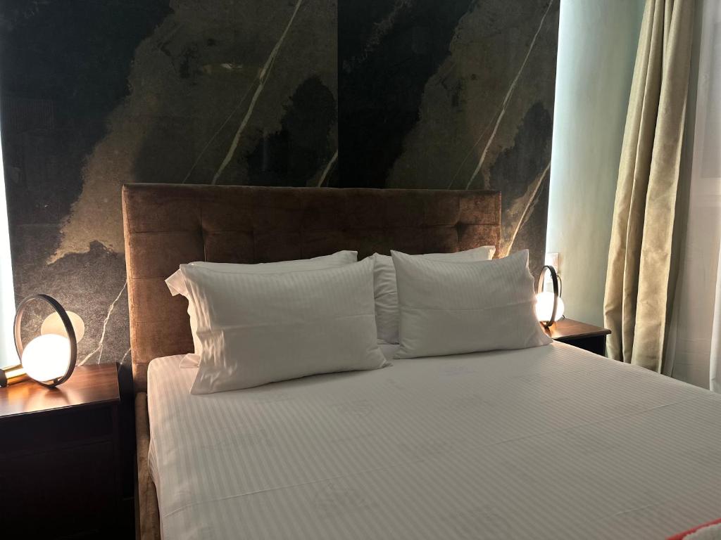 Posteľ alebo postele v izbe v ubytovaní Rooms Batalogianni