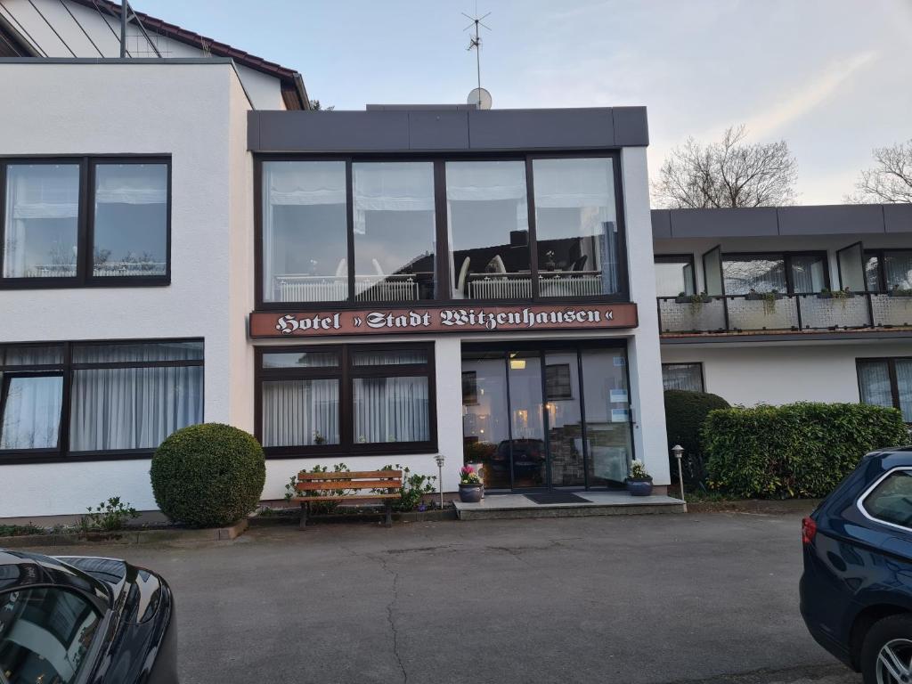 a building with a sign that readssocial renaultkritkritkritkrit at Hotel Stadt Witzenhausen in Witzenhausen