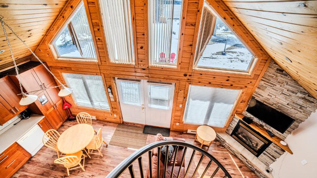 an overhead view of a dining room with windows at Muskoka Lakefront 3-bdrm Chalet in Port Carling