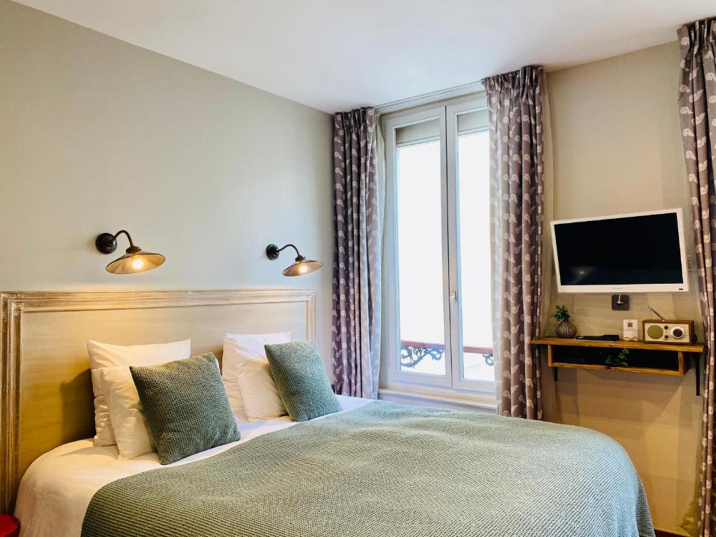 Postel nebo postele na pokoji v ubytování CamParis - B&B - Chambre d'hôtes