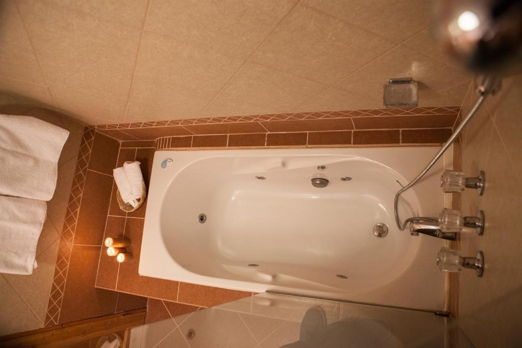 Koupelna v ubytování Maimara Hotel