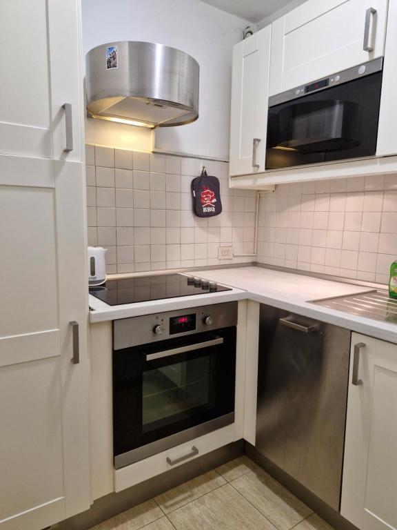 Kuchyňa alebo kuchynka v ubytovaní Coronari 45 apartment