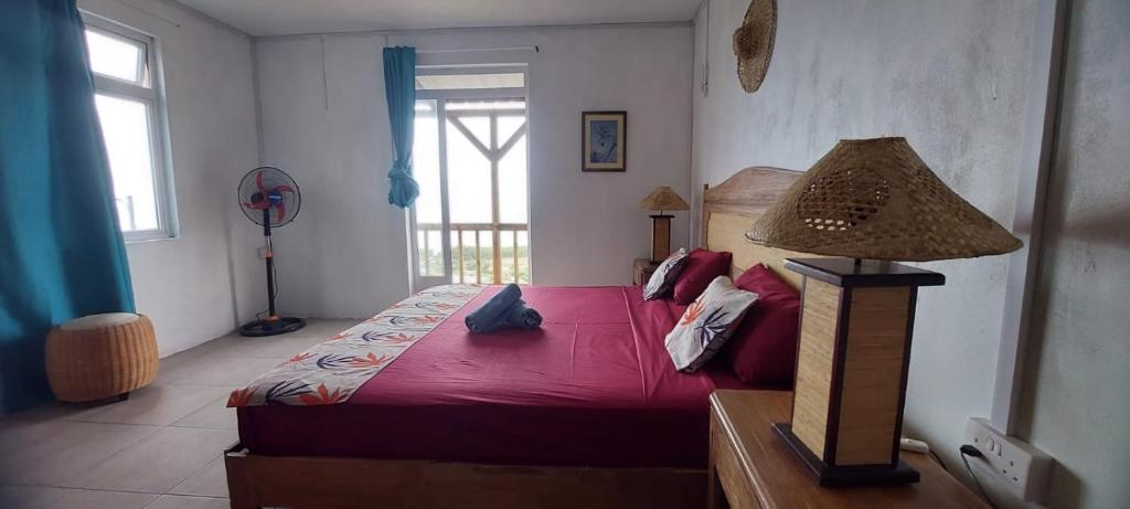 Postel nebo postele na pokoji v ubytování Residence le bijou mourouk rodrigues