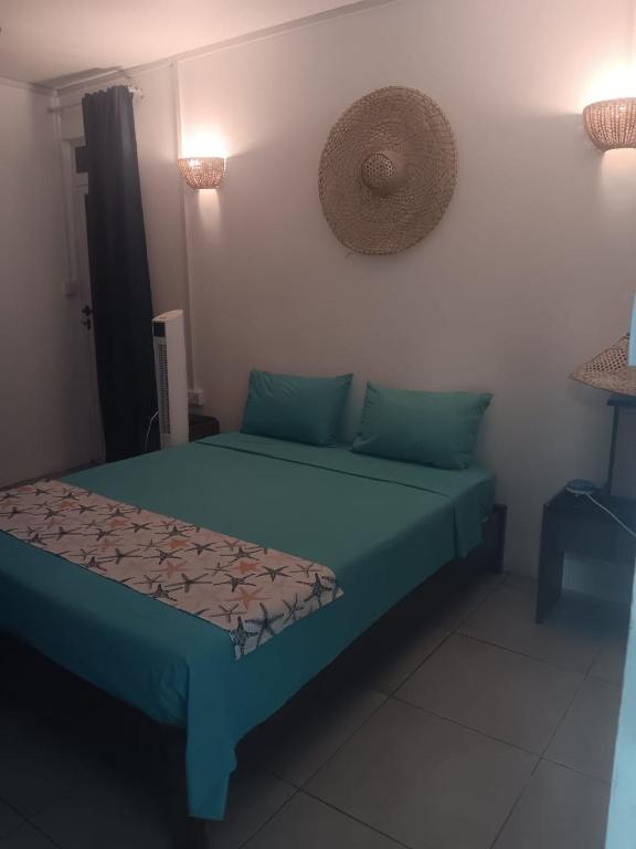 Postel nebo postele na pokoji v ubytování Residence le bijou mourouk rodrigues