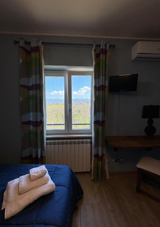 Postel nebo postele na pokoji v ubytování LA TERRAZZA SU ROMA