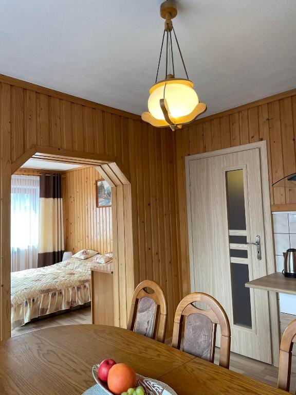 Ένα ή περισσότερα κρεβάτια σε δωμάτιο στο Apartament 5 os u Króla