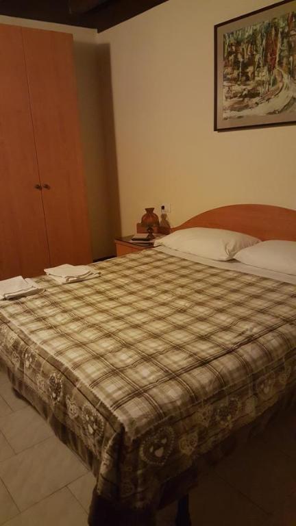 Postel nebo postele na pokoji v ubytování B&B Corte Bezzetti