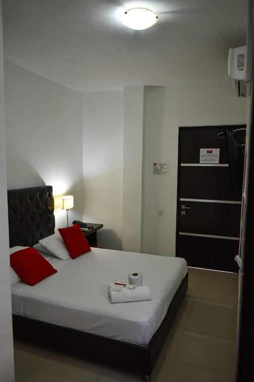 Postel nebo postele na pokoji v ubytování Hotel Or Cartagena