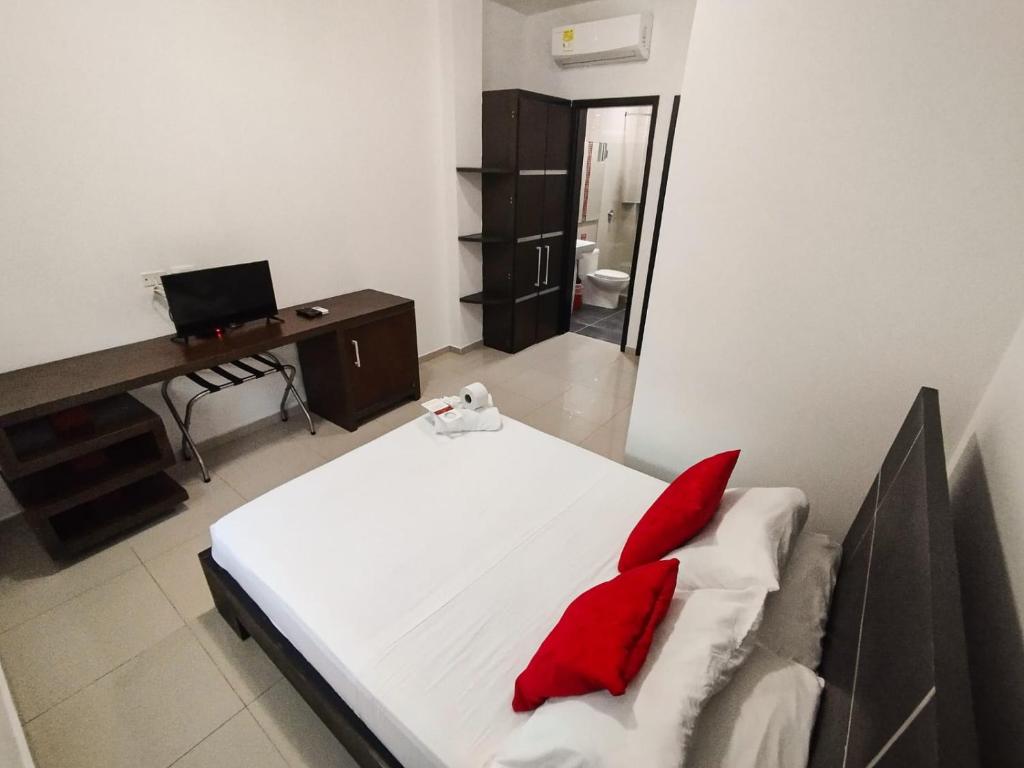Postel nebo postele na pokoji v ubytování Hotel Or Cartagena