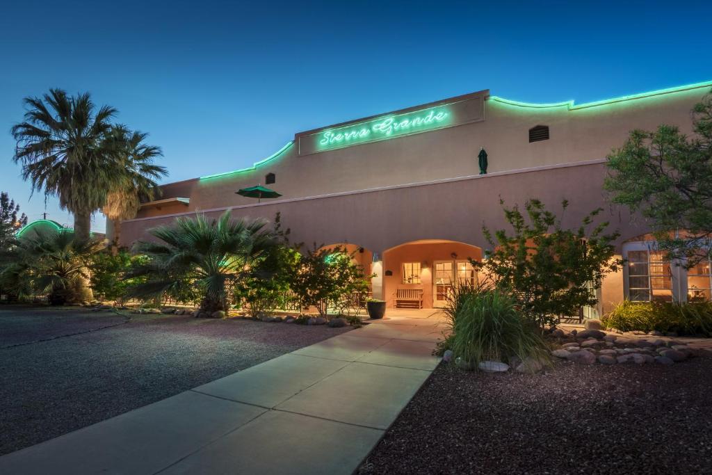 a building with a sign on the front of it at Sierra Grande Lodge & Spa in Truth or Consequences