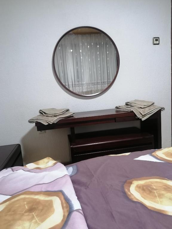 Postel nebo postele na pokoji v ubytování Etno-urban stan na dan