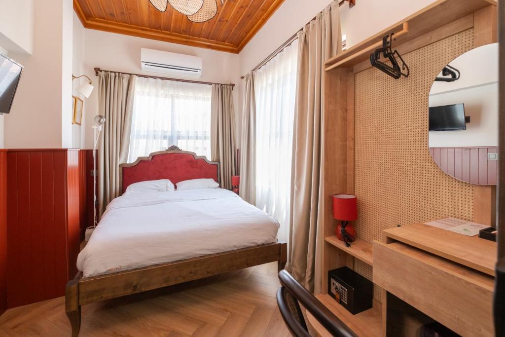 Кровать или кровати в номере Saye Konak Hotel ' Kaleiçi&Oldtown'