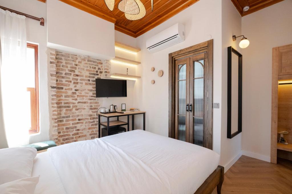 Телевизор и/или развлекательный центр в Saye Konak Hotel ' Kaleiçi&Oldtown'