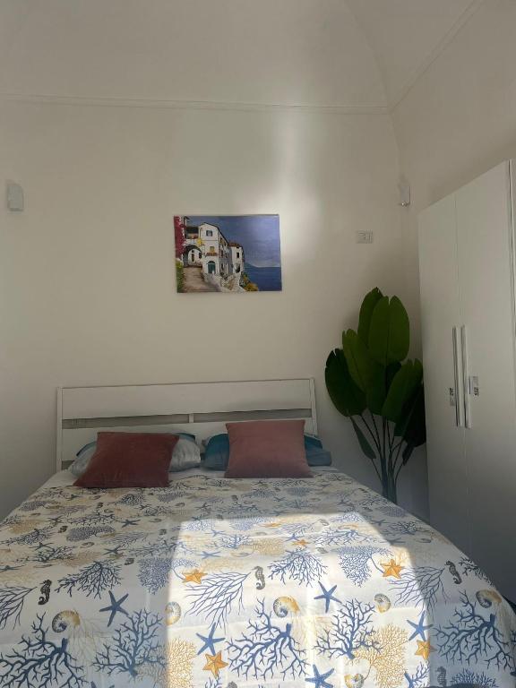 Postel nebo postele na pokoji v ubytování SUITE 21 ERCOLANO