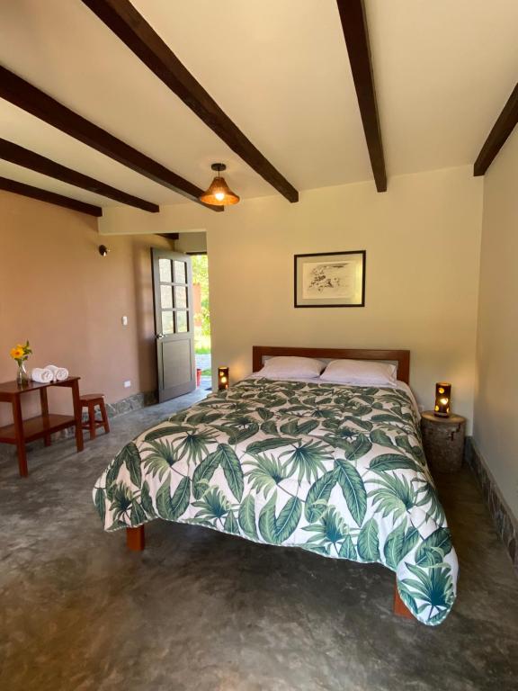 Кровать или кровати в номере La Casa de Mario - Gocta