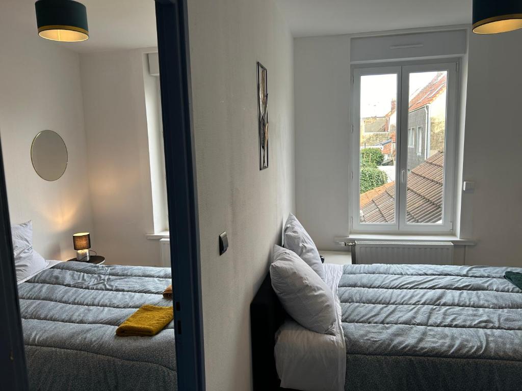 Posteľ alebo postele v izbe v ubytovaní La Maison de la Côte