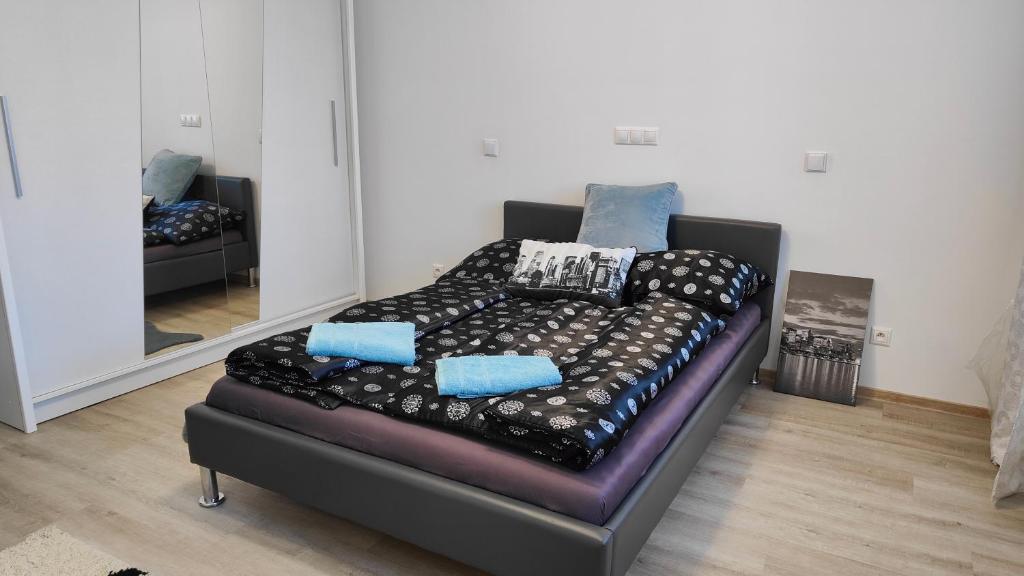Postel nebo postele na pokoji v ubytování Apartmány - Vinařství Igor Herzán