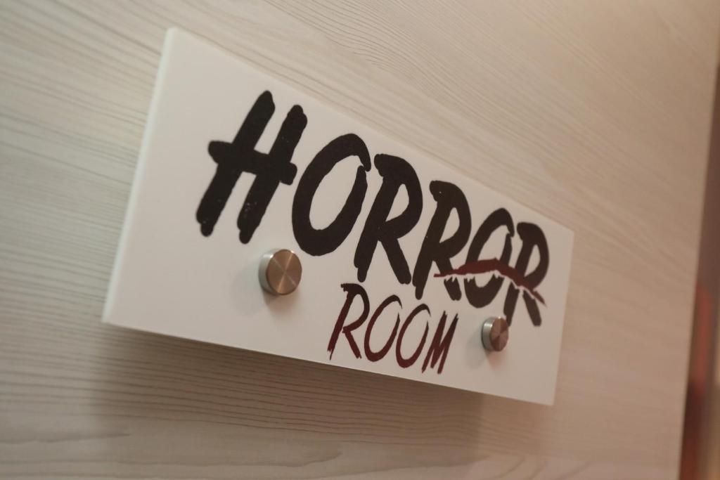 Certifikát, hodnocení, plakát nebo jiný dokument vystavený v ubytování Cineroma Guesthouse