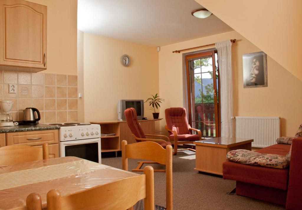 Kuchyň nebo kuchyňský kout v ubytování Apartmány Šumava