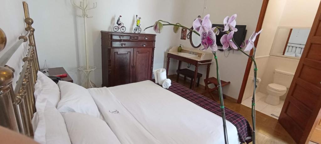 Postel nebo postele na pokoji v ubytování Hotel Don Alfonso