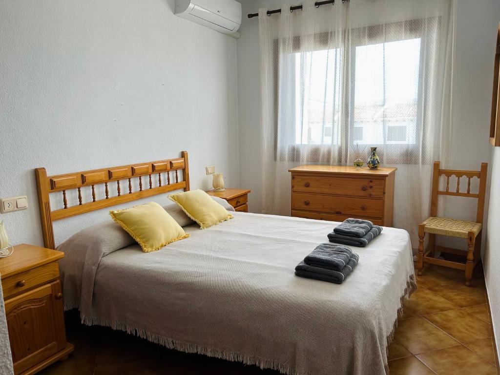 Postel nebo postele na pokoji v ubytování Apartamento Bellavista IV