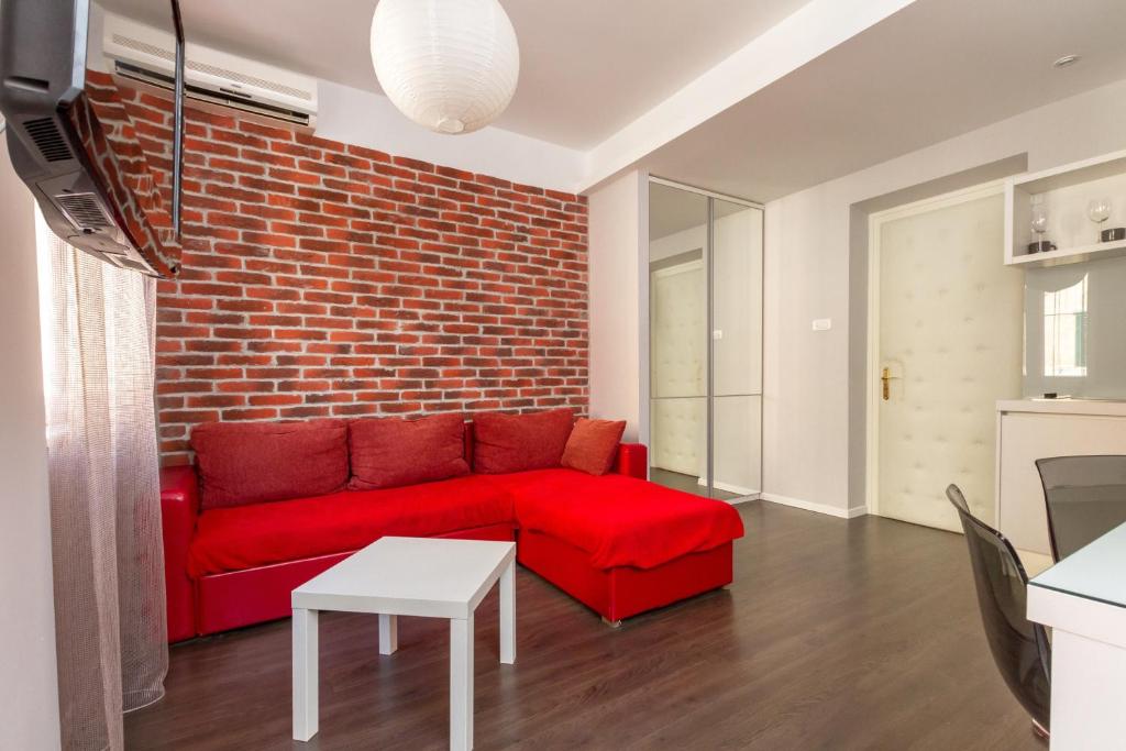 TV a/nebo společenská místnost v ubytování Apartments Aspalathos