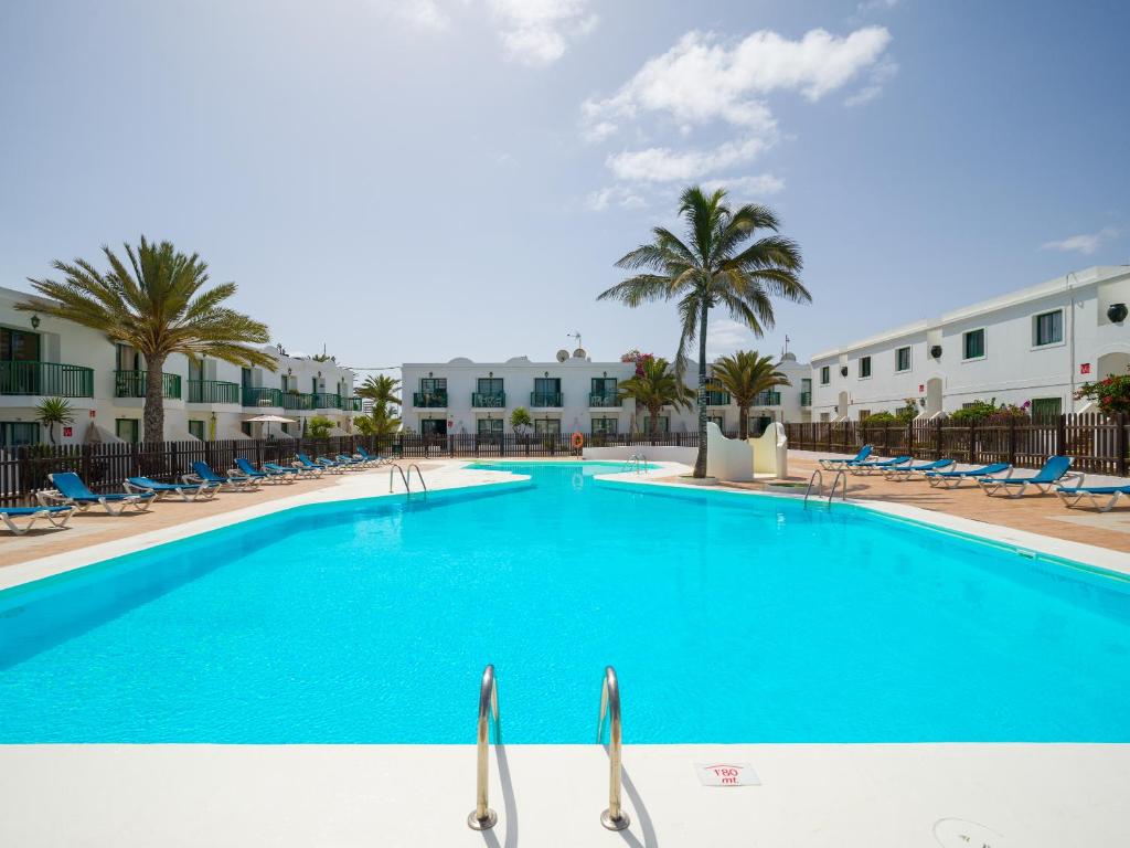 Bazén v ubytování Armonia Pool View & Wi-Fi by iRent Fuerteventura nebo v jeho okolí