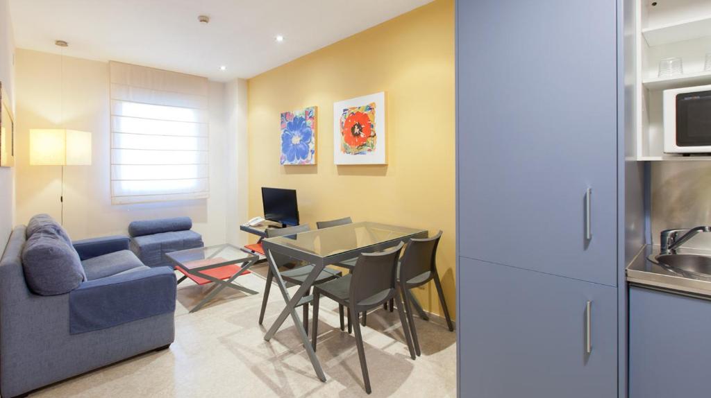 TV a/nebo společenská místnost v ubytování ApartHome®