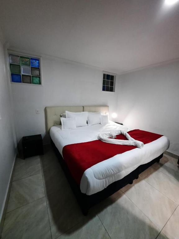 Postel nebo postele na pokoji v ubytování Hotel Zafiro Boutique
