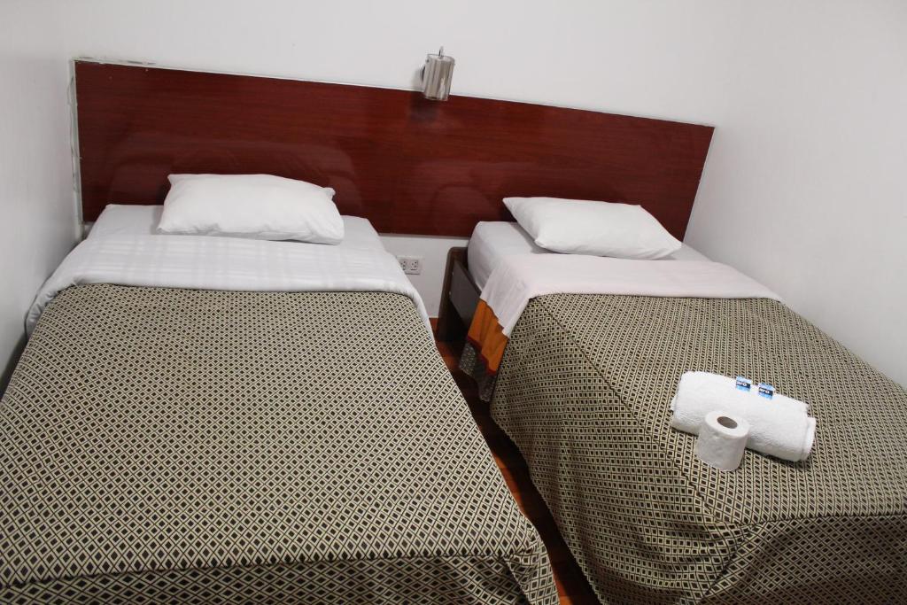 Postel nebo postele na pokoji v ubytování COPACABANA