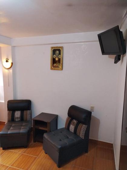 Posezení v ubytování Tierra Mágica Hostal