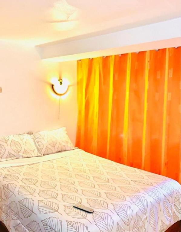 Postel nebo postele na pokoji v ubytování Tierra Mágica Hostal