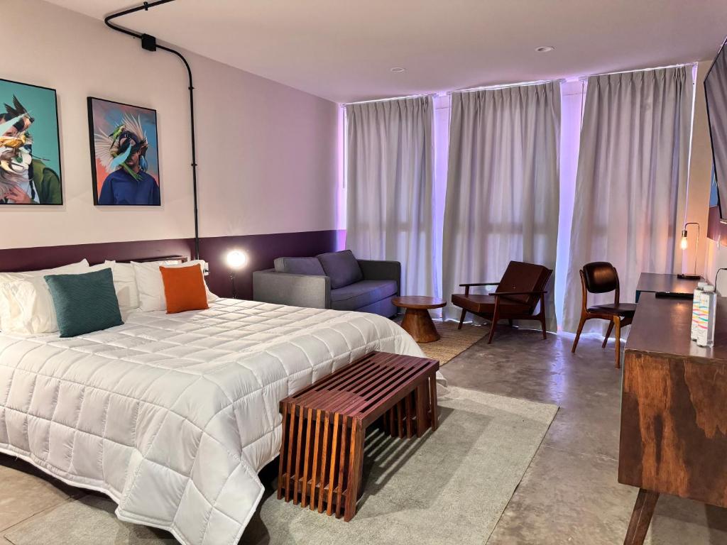 Postel nebo postele na pokoji v ubytování Hotel Olá Chapultepec