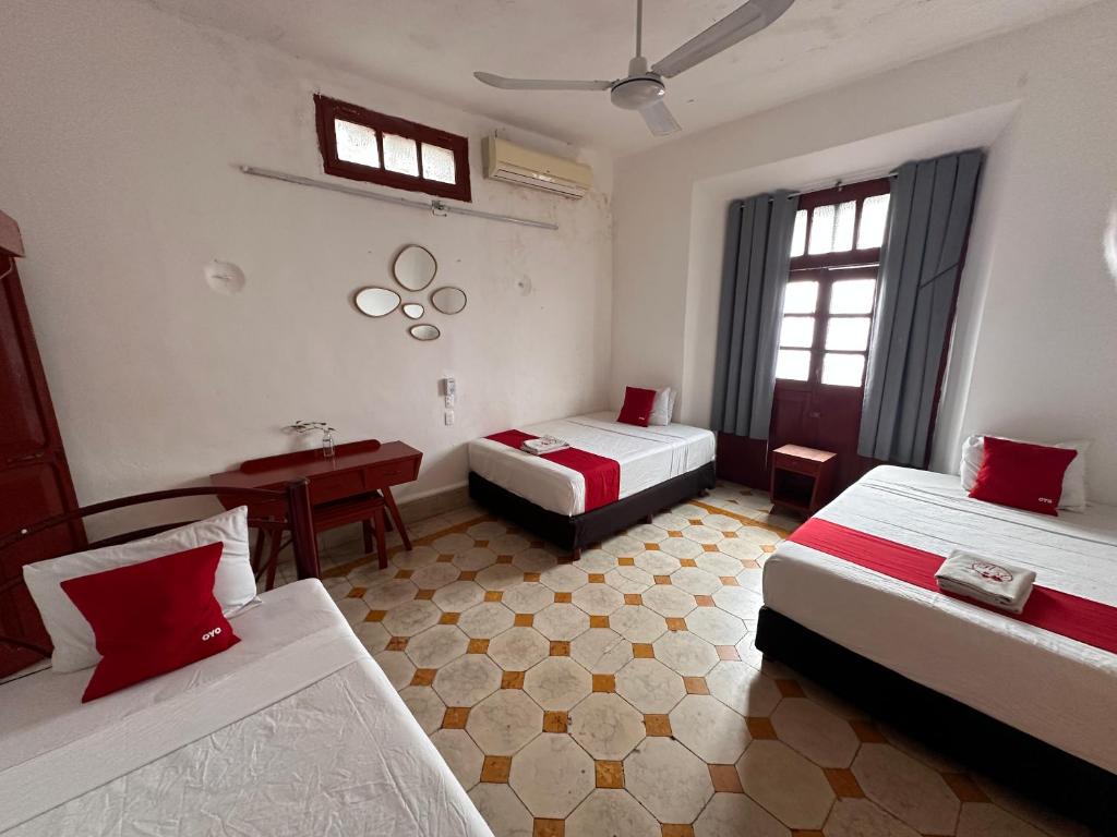 Postel nebo postele na pokoji v ubytování Hotel Margarita