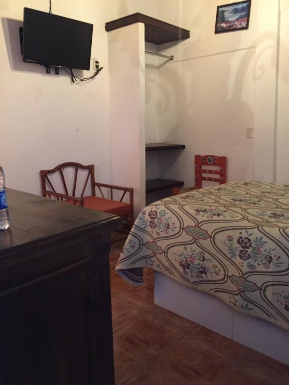 Postel nebo postele na pokoji v ubytování MARGARITA Hotel