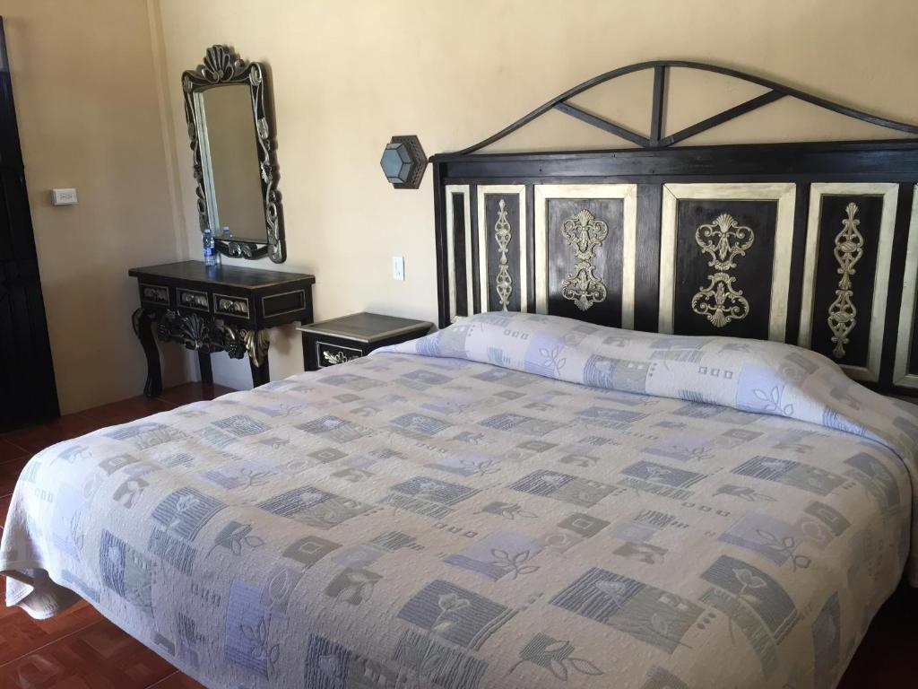 Postel nebo postele na pokoji v ubytování MARGARITA Hotel