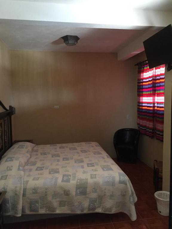 Postel nebo postele na pokoji v ubytování MARGARITA Hotel