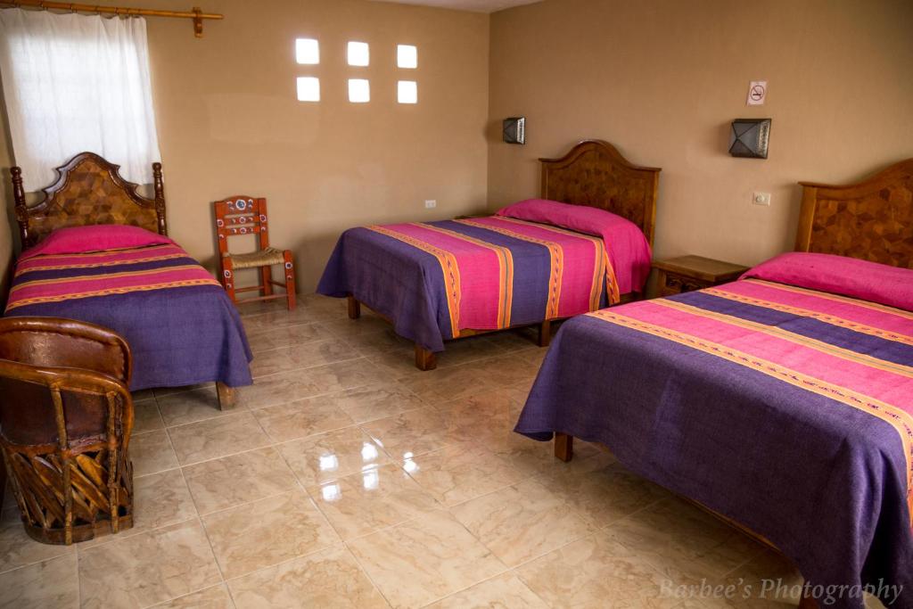 Postel nebo postele na pokoji v ubytování MARGARITA Hotel