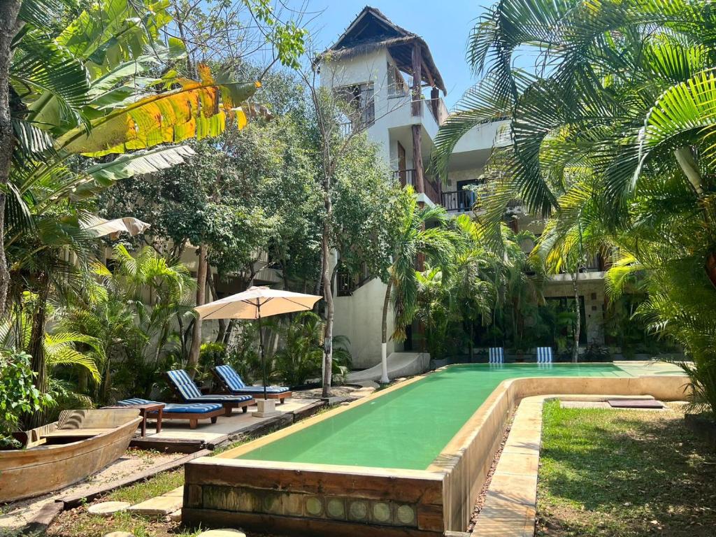 Κήπος έξω από το Casa Tulum Hotel