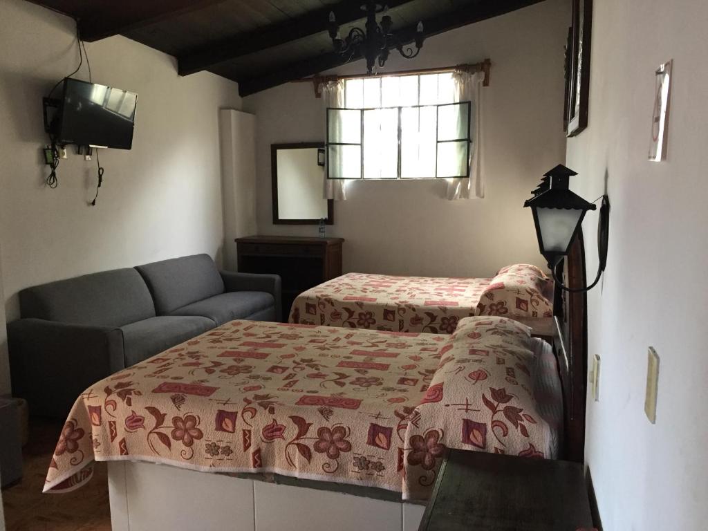 Postel nebo postele na pokoji v ubytování MARGARITA Hotel
