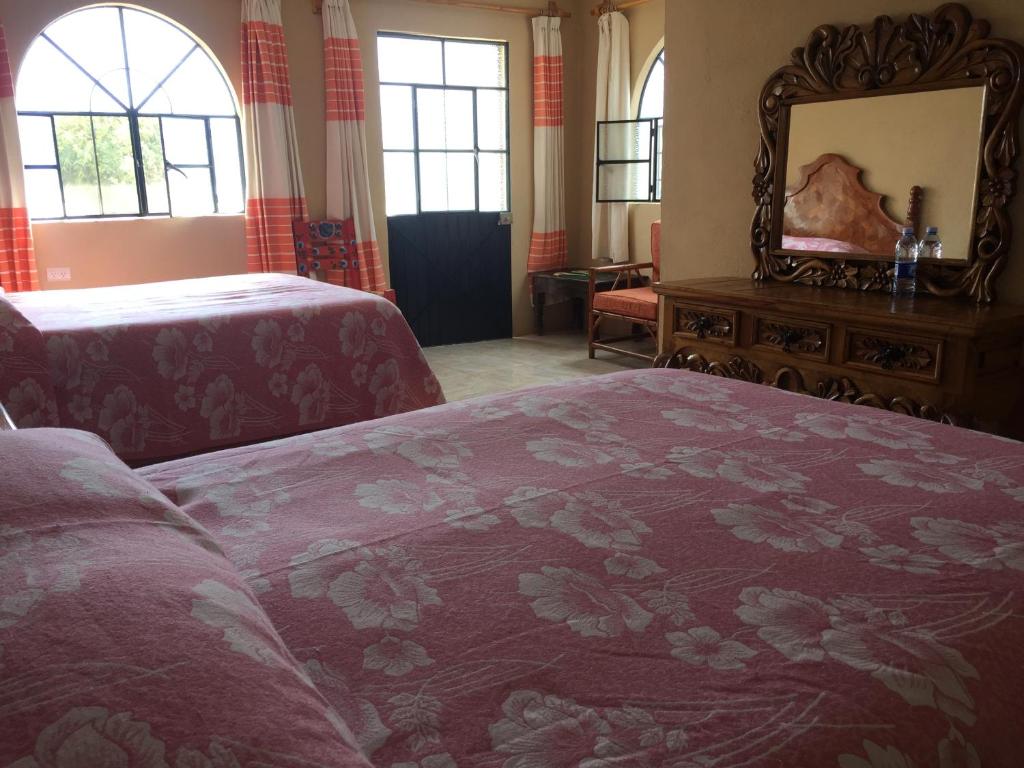 Postel nebo postele na pokoji v ubytování MARGARITA Hotel