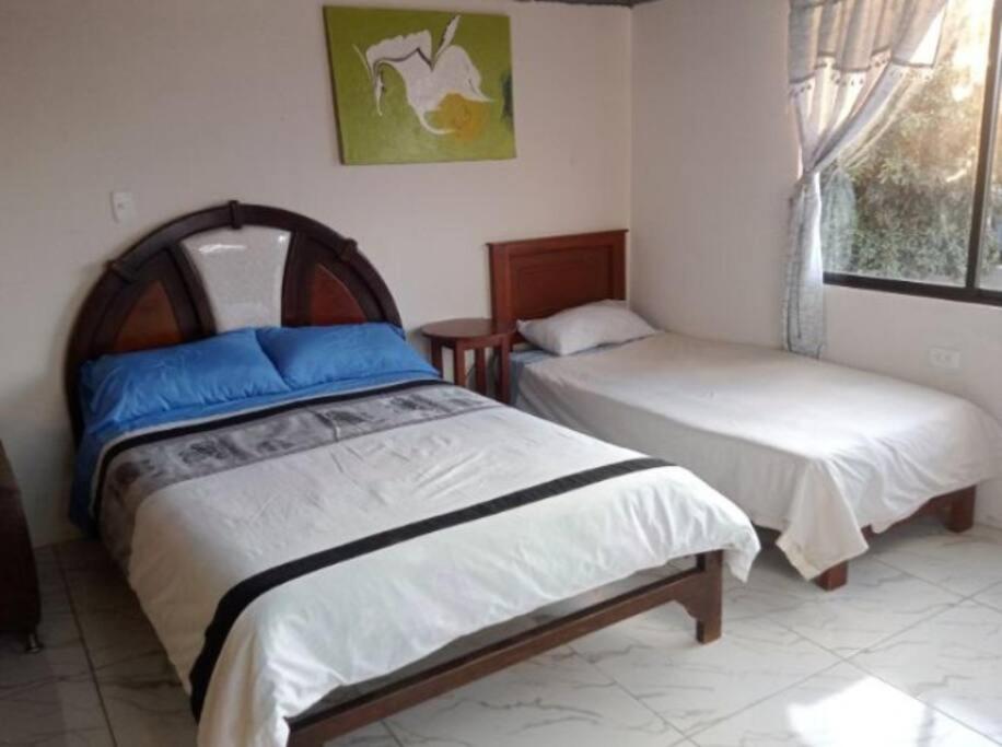 Ένα ή περισσότερα κρεβάτια σε δωμάτιο στο Terraza en las Nubes