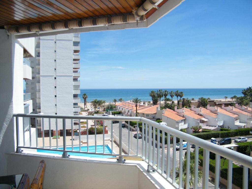 a balcony with a view of the ocean at Apartamento Playa de Gandía, 3 dormitorios, 7 personas - ES-314-8 in Gandía